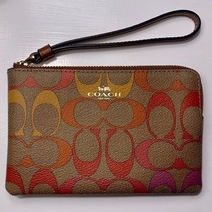 COACH Corner Zip Wristlet In Signature Canvas